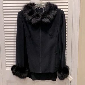 ALMA two piece skirt and fur lined jacket. Color black.